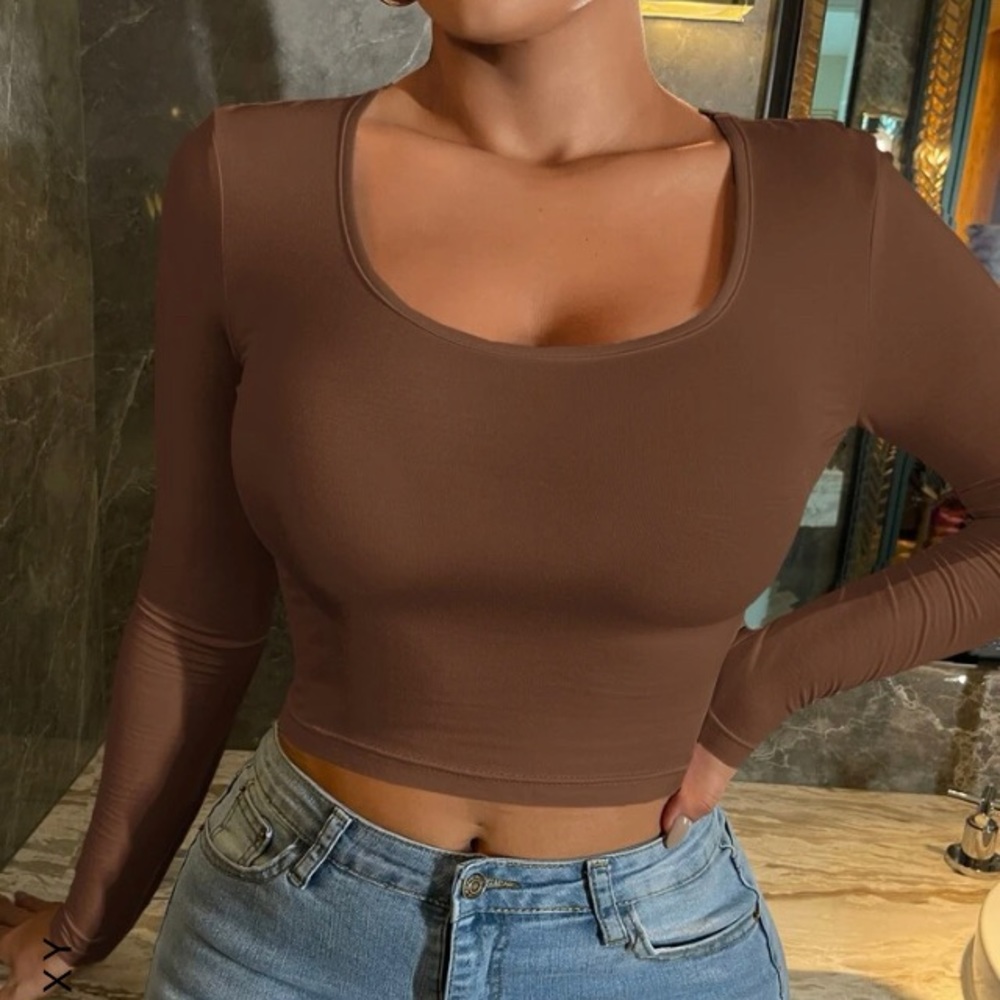 The shirt is tight, but in a good way. It tightens you in all the right places.